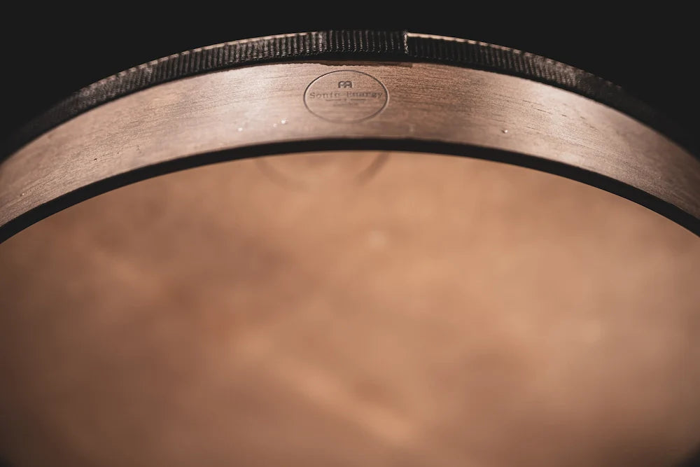 18-inch walnut brown hand drum from Utah Energy Healing Center, showing the textured surface and natural wood finish.