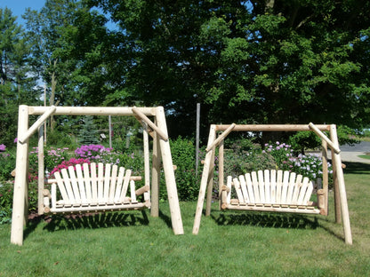 Wooden porch swing with canopy from Cedar Creek Rustic Furniture, featuring a sturdy frame and cozy outdoor seating.