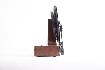 Fuse Audio GLD vertical vinyl record player turned to the side, showcasing its sleek design and turntable components.