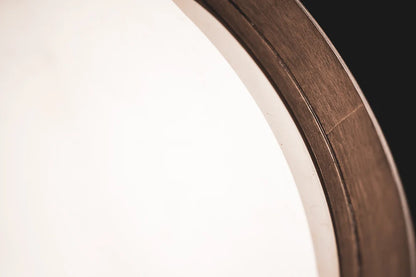 16-inch Triskele hand drum by Utah Energy Healing Center, featuring a natural wood finish and intricate triskele design, suitable for meditation.