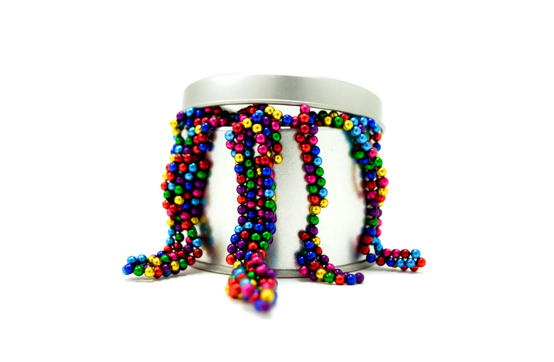 Set of small magnetic metal balls, 3mm fidget toy by USB Memory Direct, arranged in a geometric pattern on a white background.