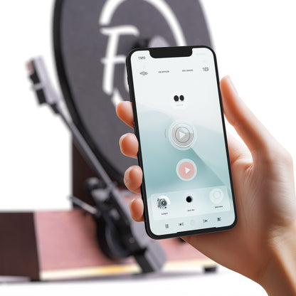 Fuse Audio GLD vertical vinyl record player with Bluetooth connectivity, showcasing its sleek design and record display.