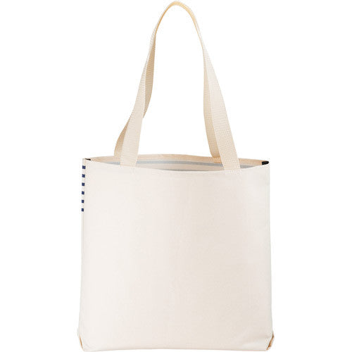 Large Stripe Beach Tote by Sand By Saya New York with blue and white striped fabric and sturdy handles for beach accessories.