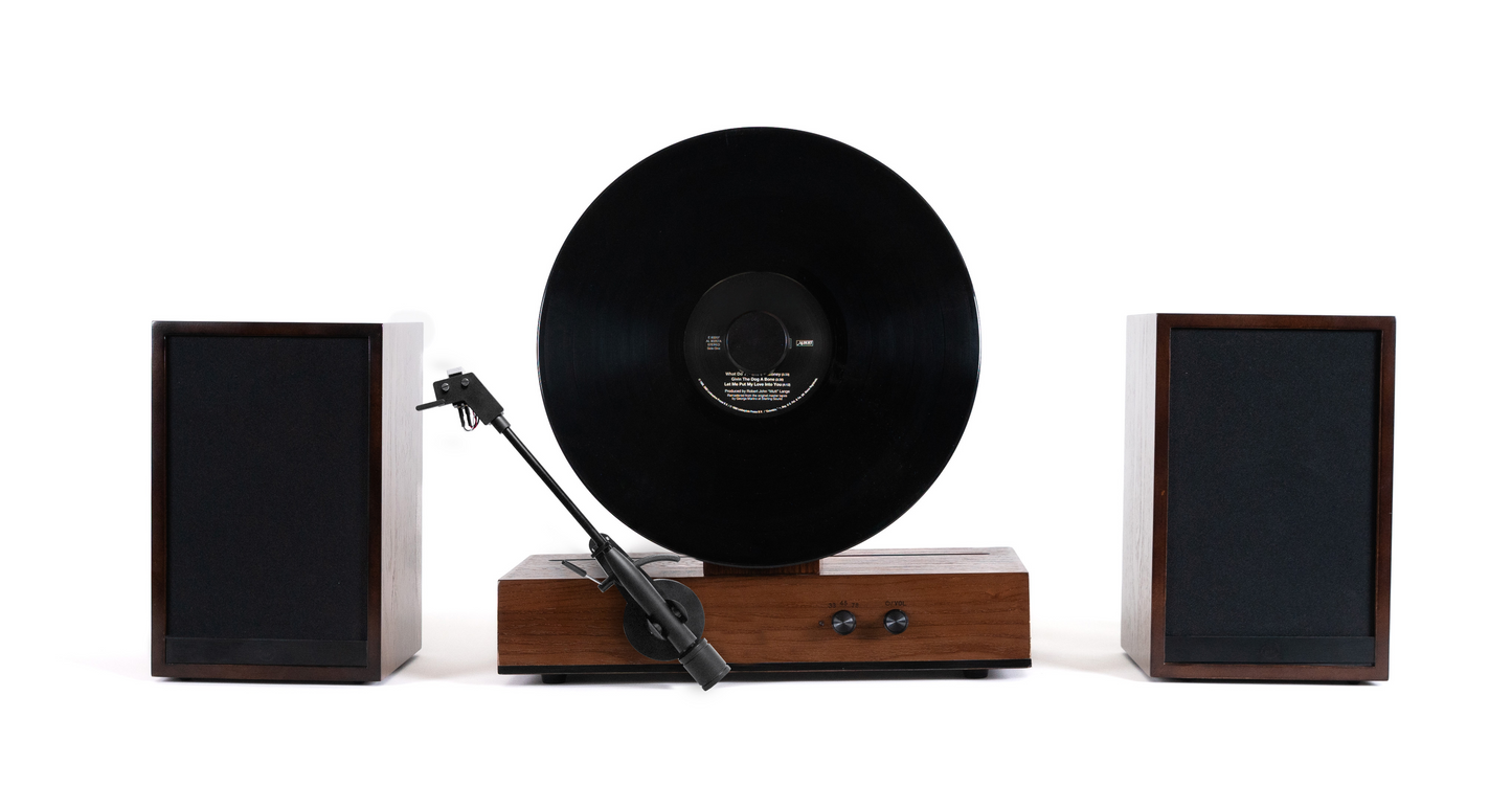 Fuse Audio GLD vertical vinyl record player, black turntable with tonearm and control knobs, designed for vintage-style audio playback.