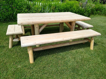 Handmade rustic outdoor picnic table with four benches by Cedar Creek Rustic Furniture, ideal for patio and garden dining.