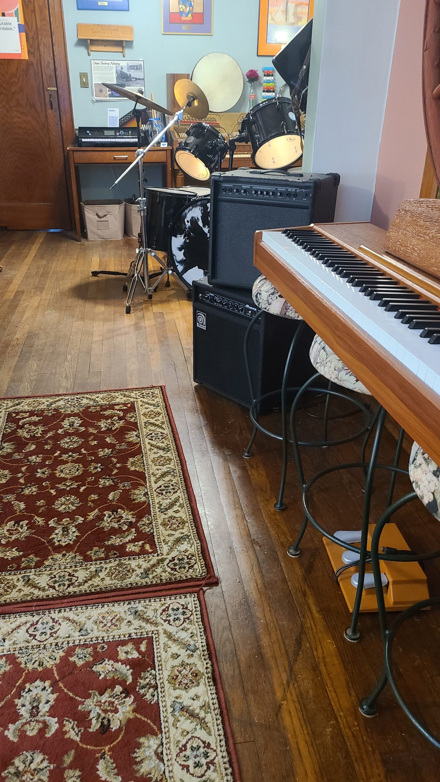 Music rehearsal space from Ozaukee Talent Registrations, showing a soundproof room with musical instruments and rehearsal equipment.